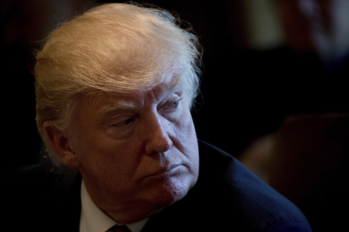 President Donald Trump attends a Cabinet meeting on Monday in the Cabinet Room of the White House in Washington.