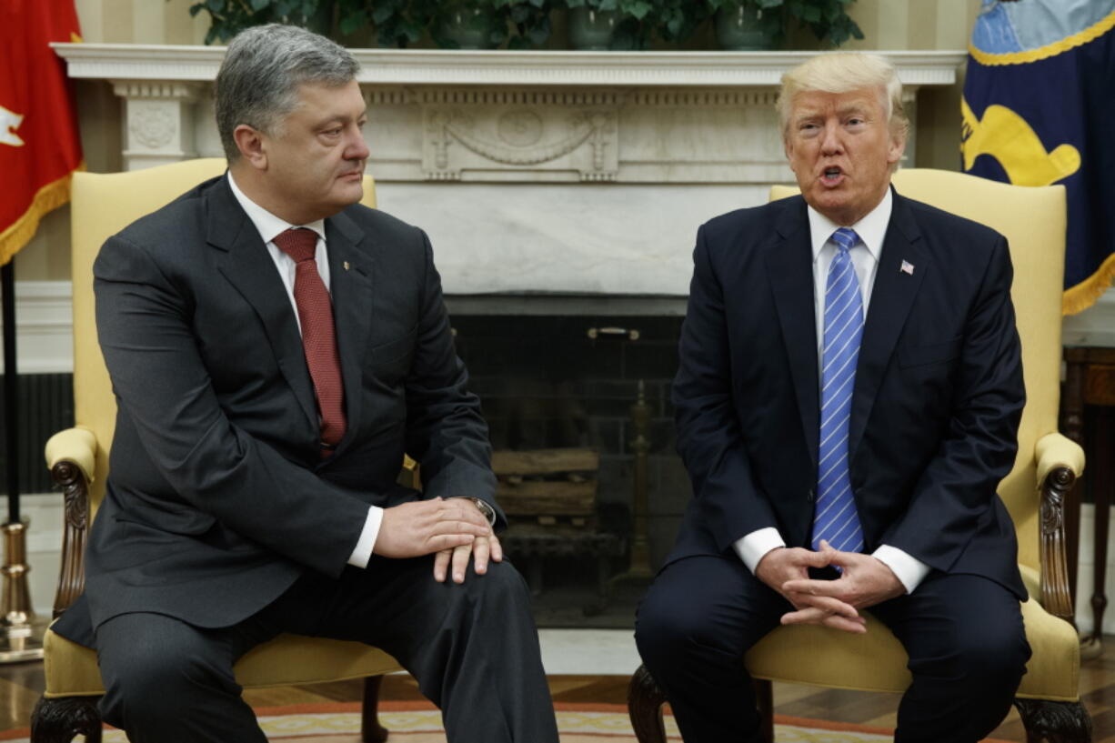 President Donald Trump speaks Tuesday during a meeting with Ukrainian President Petro Poroshenko in the Oval Office of the White House, in Washington.