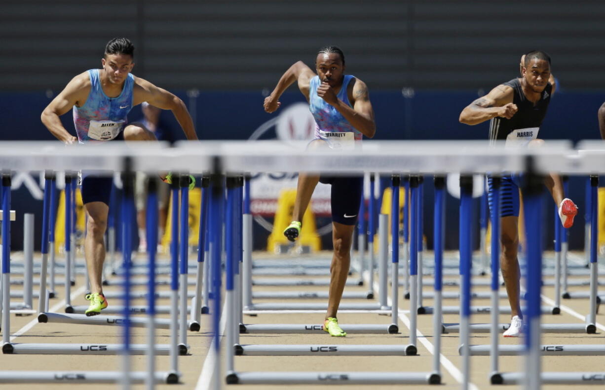 From left, Devon Allen, Aries Merritt, and Aleec Harris run the men's 110-meter hurdles at the U.S. Track and Field Championships, Sunday, June 25, 2017, in Sacramento, Calif. Harris won the event, Merritt finished second, and Allen finished third.