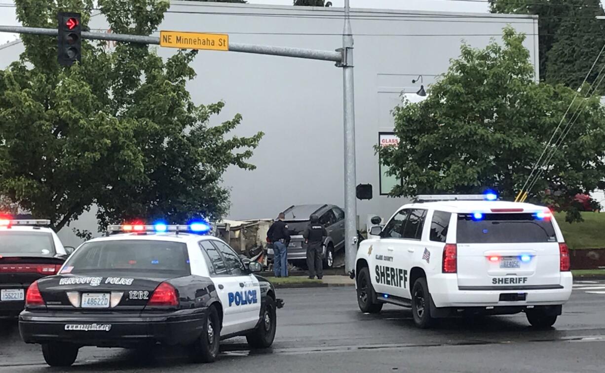 Police are searching for a robbery suspect in Hazel Dell after a vehicle crashed into a building on Northeast 47th and Minnehaha Street after a high-speed chase.