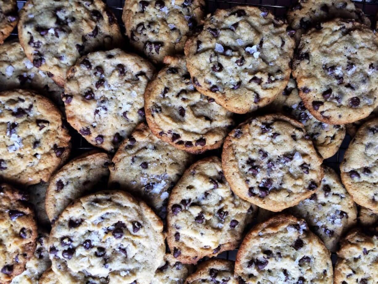 Salted Tahini Chocolate Chip Cookies. The secret ingredients are tahini, a paste of sesame seeds, and flaky salt. The tahini adds richness and depth and the salt adds a crunchy surprise. These are adult cookies.