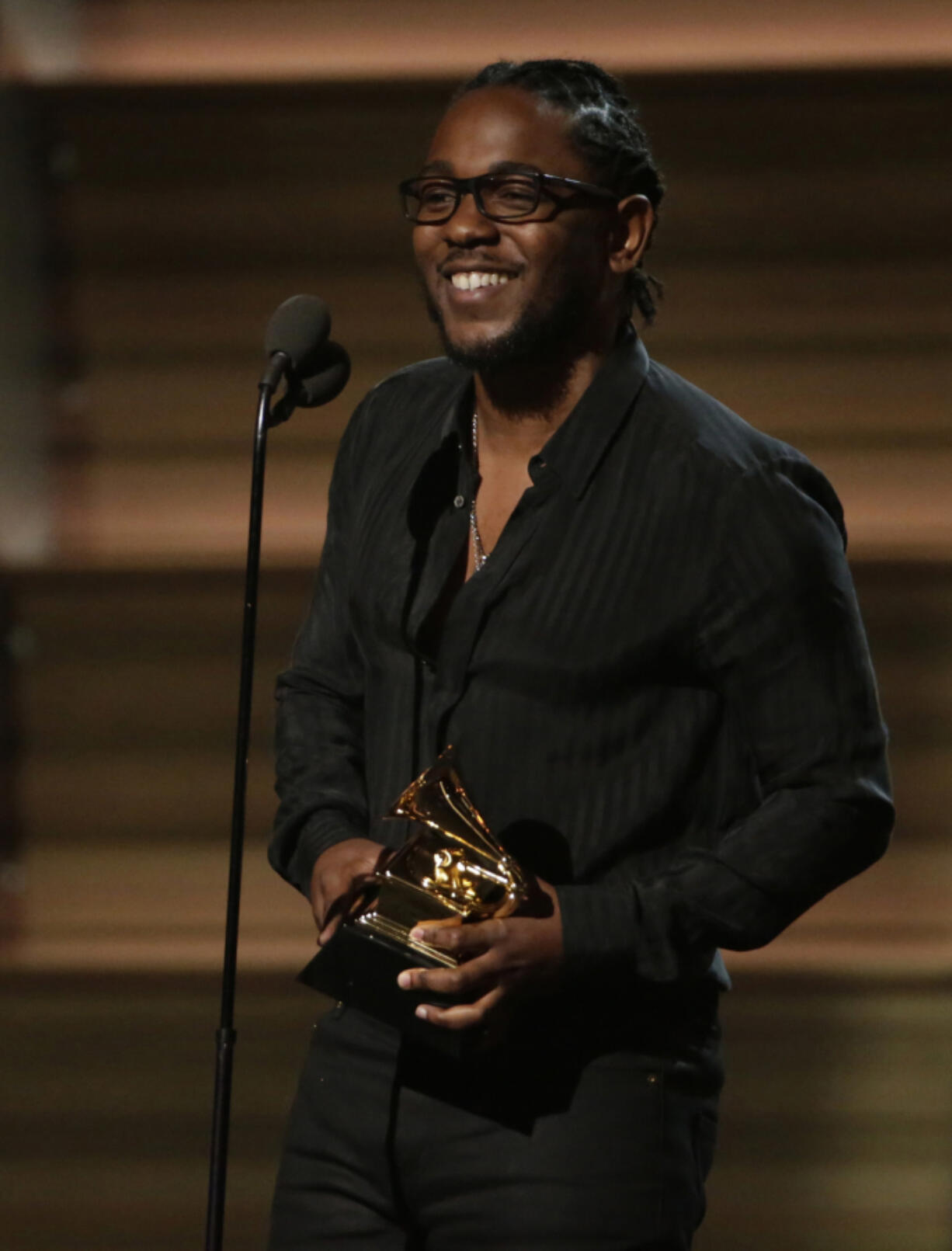 Kendrick Lamar accepts a Grammy for Best Rap Album at the 58th Annual Grammy Awards on Feb. 15, 2016, at the Staples Center in Los Angeles.