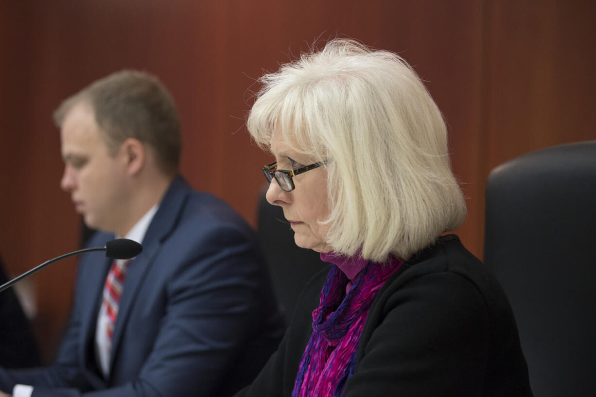 New Clark County council members John Blom, left, and Eileen Quiring listen during a Jan. 17 meeting in council chambers.