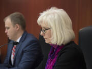 New Clark County council members John Blom, left, and Eileen Quiring listen during a Jan. 17 meeting in council chambers.