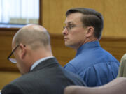 Former Evergreen High School teacher Matthew Morasch appears for opening statements in his voyeurism trial Tuesday.