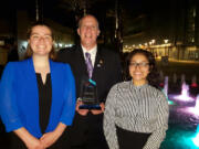 Orchards: Heritage High School Future Business Leaders of America members Victoria Thornton, from left, Bob Berrigan, faculty adviser, and Elvia Santos-Dominguez traveled to Anaheim, Calif., to participate in the organization’s national conference.