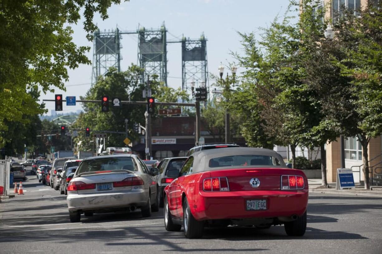 Drivers sit in congested traffic on Washington Street in downtown Vancouver as they line up to get on southbound Interstate 5 last July.