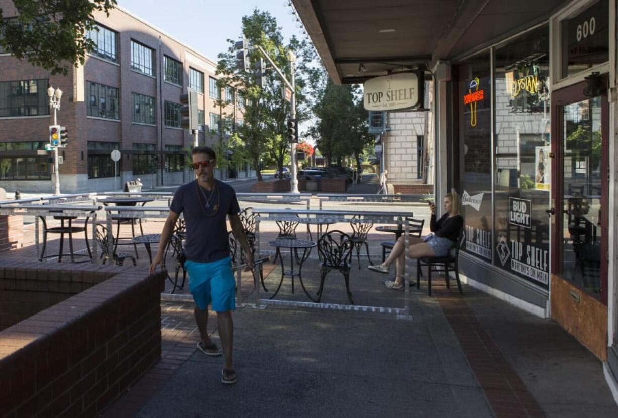 Musician Tony Smiley walks around Top Shelf in downtown Vancouver before his performance at the bar on Friday evening.