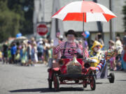 Members of the Southwest Washington Shrine Clowns entertained the crowds Saturday at the annual Camas Days Grand Parade that was celebrating the theme “Once Upon a Time.”  (Photos by Randy L.