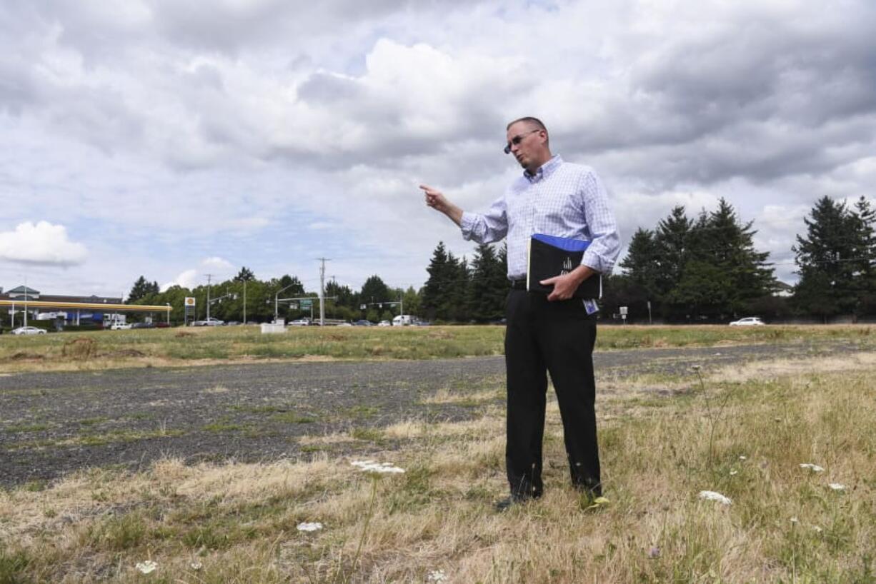 C-Tran Planning, Development and Public Affairs Director, Scott Patterson, standing in part of the Fisher’s Landing Transit Center property at the corner of Southeast 164th Avenue and Southeast Cascade Park Drive that will be considered in an upcoming transit-oriented development study.