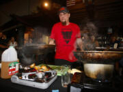 Michael Garofalo, executive chef at Heathen Brewing Feral Public House, competes at the Extreme Food Fights cooking competition at WareHouse ‘23.