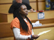 Fontella Hooper, the driver who stood accused in a fatal Vancouver crash, reads a letter to the victims’ family in Clark County Superior Court after pleading guilty Friday. She was sentenced to more than nine years in prison.