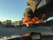 A view from inside a firetruck as it arrives at the scene shows how the fire burned hot and extremely smoky. The smoke plume was visible for a long distance.