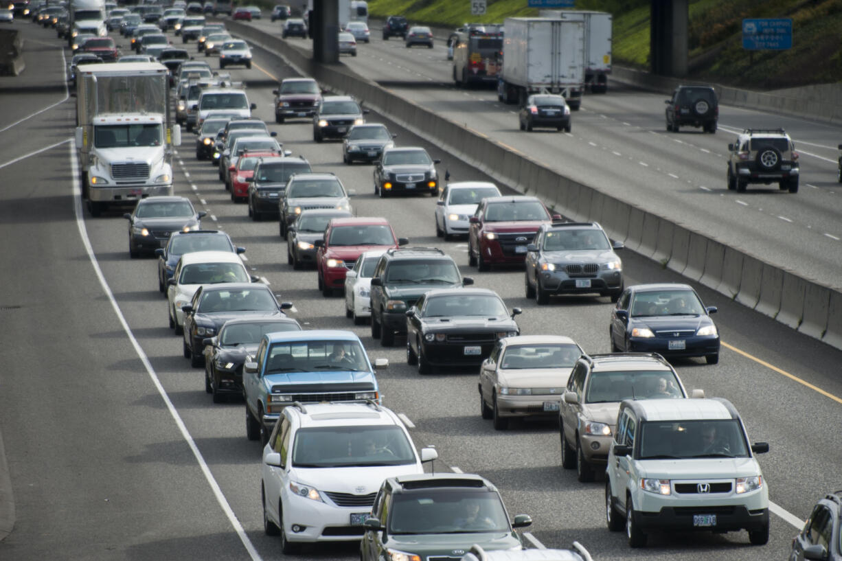 Traffic heads north (left) and south (right) in Portland on Interstate 5 in April 2015. Oregon has moved closer to passing a transportation package that could bring rush-hour tolls to I-5 and I-205.