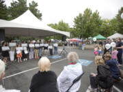 A previous crop of student poets displays poem placards that went up on C-Tran buses as part of the local “Poetry Moves” program. Another group of student poets will read original bus-bound works at 11:30 a.m. Saturday at the Vancouver Farmers Market music stage.