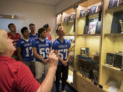 Freedom Bowl Classic football players tour the historical display room Shriners Hospital in Portland Wednesday, July 5, 2017.