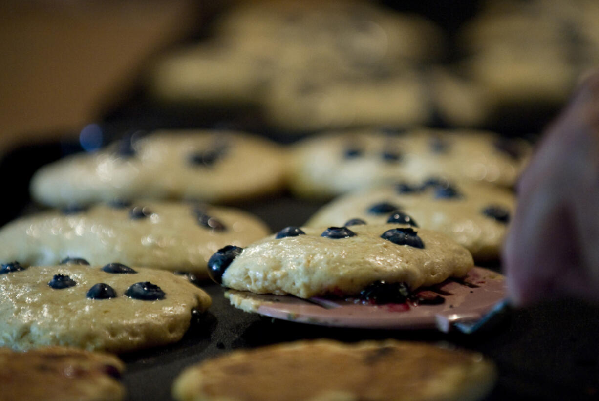 Take a bite of blueberry pancakes during a sampling event at the Cedar Creek Grist Mill.