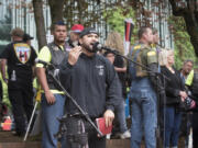 Local political activist Joey Gibson speaks at a rally he helped organize in Portland June 4. Gibson rejects most political labels, preferring conservative-libertarian.
