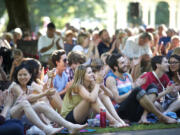 A crowd of all ages enjoys a free concert in Esther Short Park by the Vancouver Symphony Orchestra in 2013.