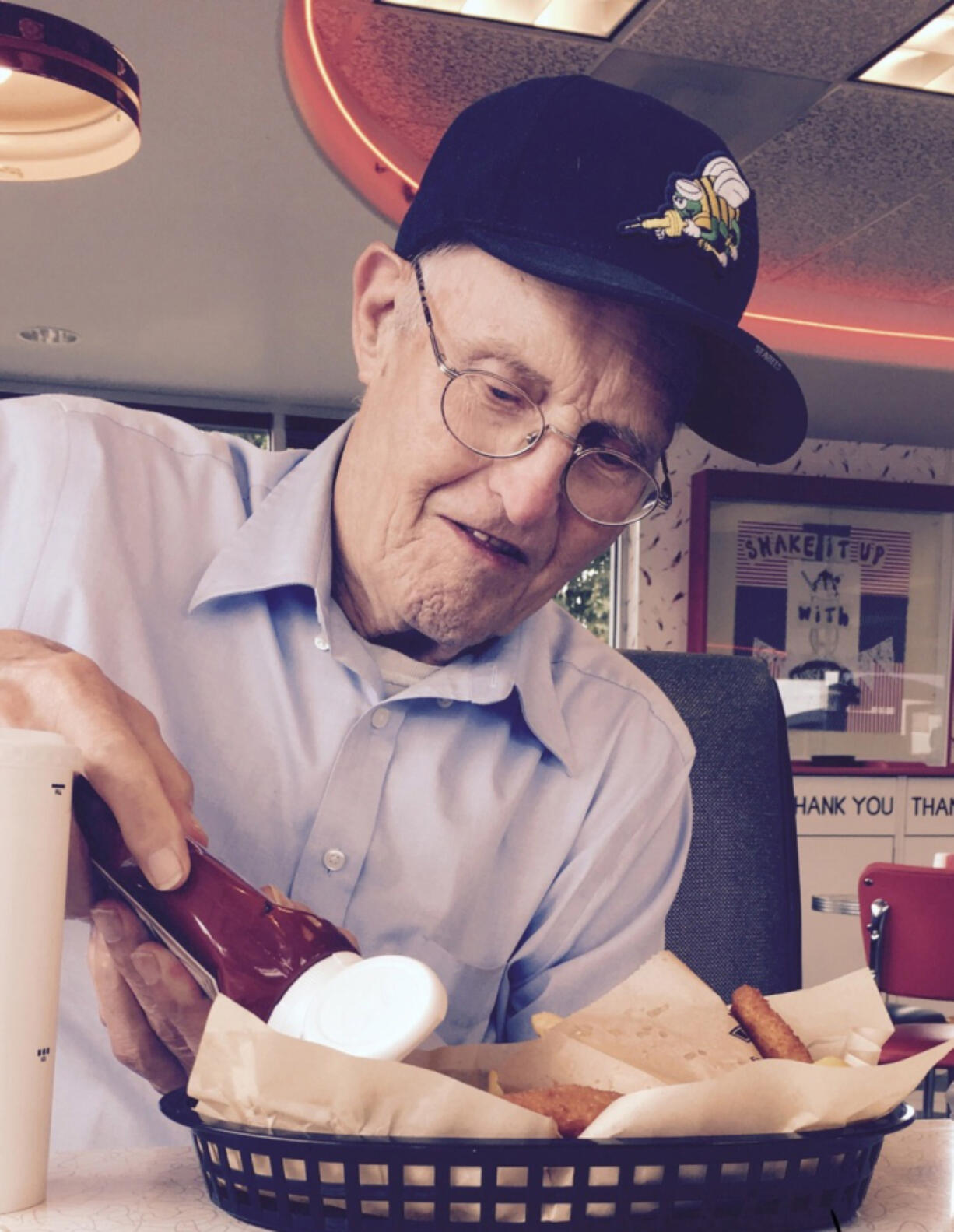 Wilford R. “Ray” Johnson Pictured here with the cap he often wears.