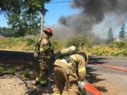 Firefighters get to work in the Hockinson area Wednesday.