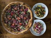 The Strawberry Fields pizza, left, sautéed summer squash, top right, and the chickpea and barley salad, bottom right, are pictured at Mt. Tabor Brewing in Felida.