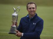 Jordan Spieth of the United States holds the Claret Jug after winning the British Open Golf Championships at Royal Birkdale, Southport, England, Sunday July 23, 2017.