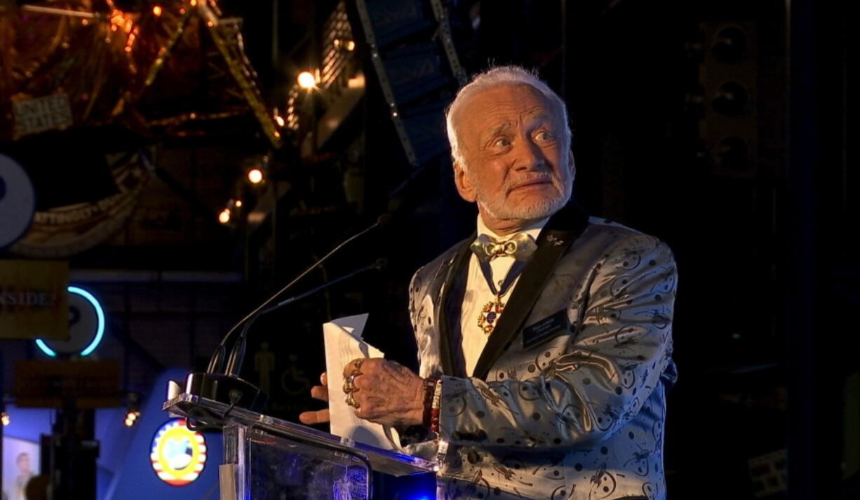 Apollo 11 astronaut Buzz Aldrin speaks at the commemoration for the upcoming anniversary of the 1969 mission to the moon and a gala for his non-profit space education foundation, ShareSpace Foundation, at the Kennedy Space Center in Cape Canaveral, Fla., on Saturday.