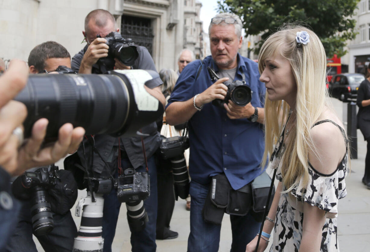 Connie Yates, mother of critically ill baby Charlie Gard arrives at the Royal Court of Justice in London on Tuesday. Lawyers for the family of critically ill infant Charlie Gard and the hospital treating him were returning to court for a hearing Tuesday, a day after the baby’s parents said they were dropping their long legal battle to get him experimental treatment. The subject of Tuesday’s hearing at the High Court in London was not immediately clear.