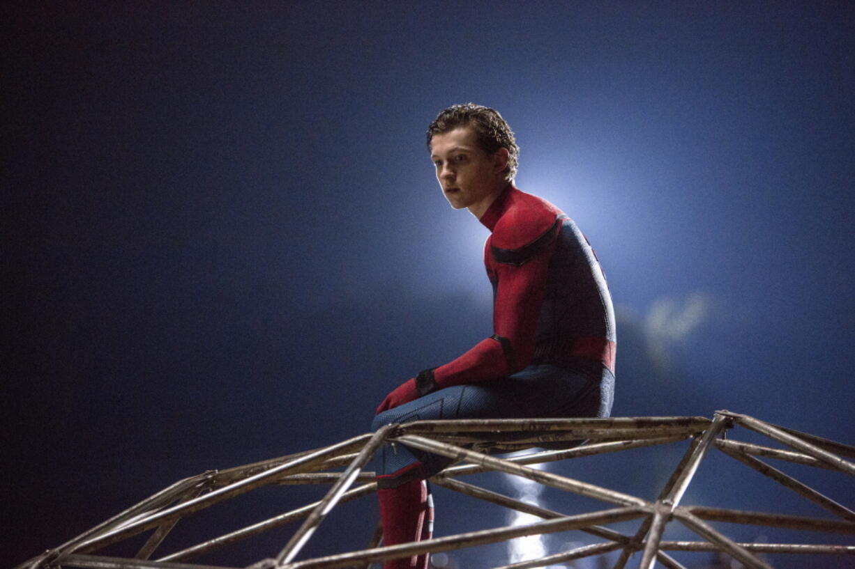 This image released by Columbia Pictures shows Tom Holland in a scene from “Spider-Man: Homecoming.” (Chuck Zlotnick/Columbia Pictures-Sony via AP)