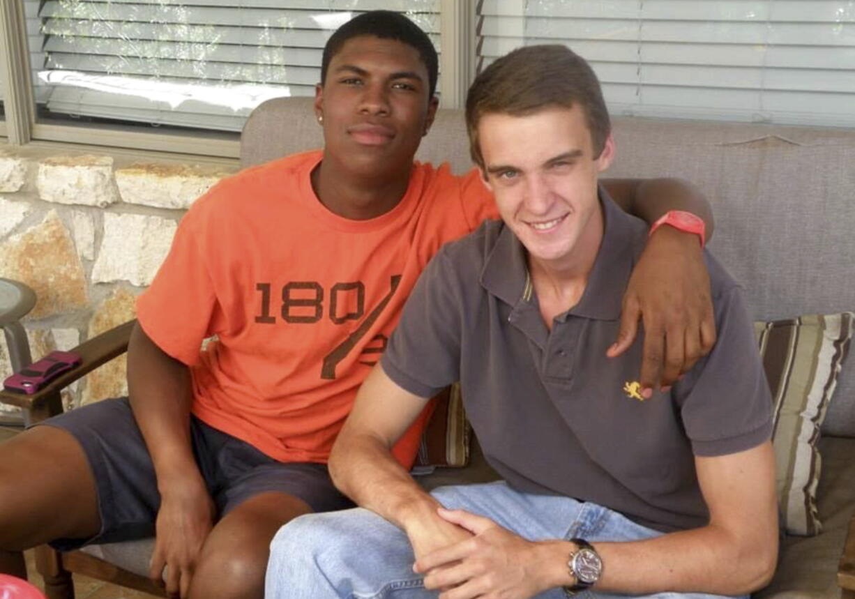 Bakari Henderson, left, was vacationing with friends