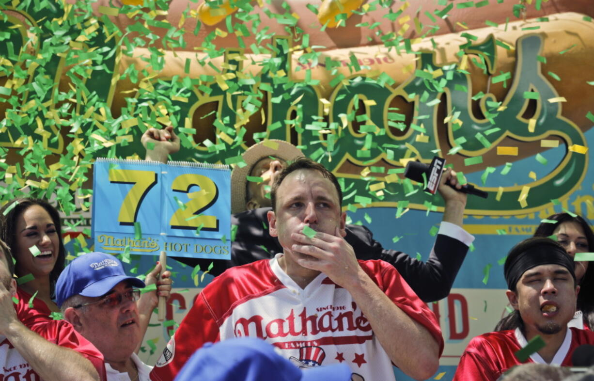 Joey Chestnut wins the Nathan's Famous Hot Dog Eating Contest, marking his 10th victory in the event, Tuesday, July 4, 2017, in the Brooklyn borough of New York. He downed 72 hot dogs and buns in 10 minutes.