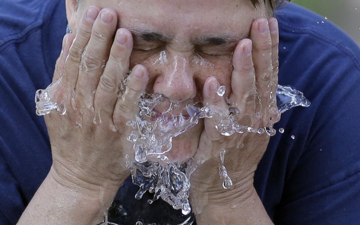 A man cools off at a water fountain June 21 in Liberty Park in Salt Lake City. American meteorologists calculate that the first half of 2017 has been the second warmest on record for Earth, only behind last year. NOAA announced Tuesday, July 18, 2017, Earth’s average temperature from January to June has been 57.9 degrees (14.4 degrees Celsius). That’s more than a-degree-and-a-half warmer than the 20th century average.