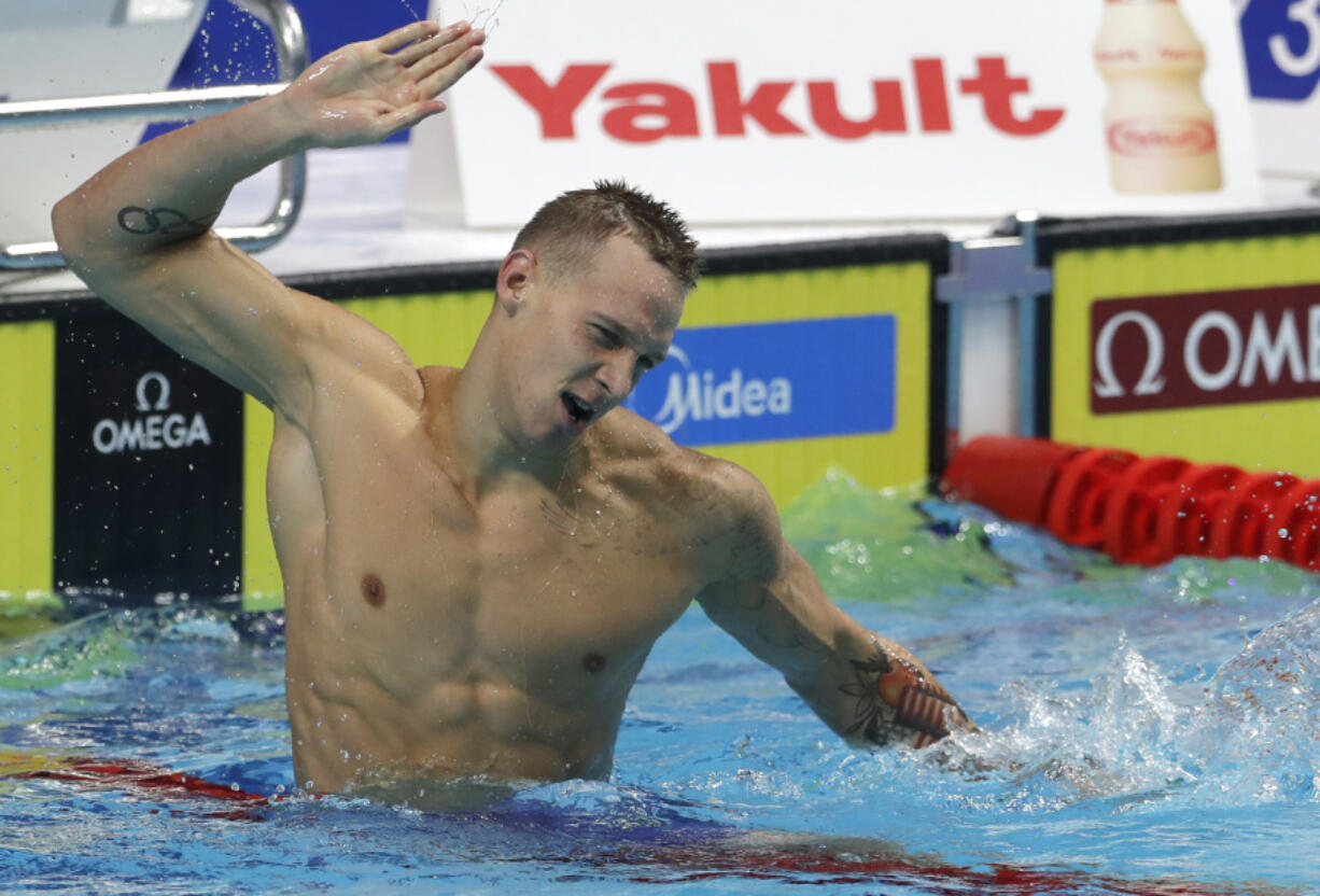 United States’ Caeleb Remel Dressel celebrates after winning the gold medal in the men’s 100-meter butterfly final during the swimming competitions of the World Aquatics Championships in Budapest, Hungary, Saturday, July 29, 2017.