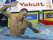 United States’ Caeleb Remel Dressel celebrates after winning the gold medal in the men’s 100-meter butterfly final during the swimming competitions of the World Aquatics Championships in Budapest, Hungary, Saturday, July 29, 2017.