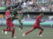 Portland Timbers' Fanendo Adi (9) fires a shot on goal against the Chicago Fire during an MLS soccer match Wednesday, July 5, 2017, in Portland, Ore.