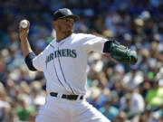 Seattle Mariners starting pitcher Yovani Gallardo throws against the New York Mets in the first inning of a baseball game, Saturday, July 29, 2017, in Seattle. (AP Photo/Ted S.