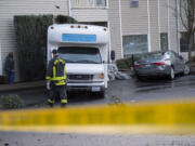 Firefighters and onlookers check out the scene at Vancouver Pointe Senior Village on Friday morning, Feb. 10, 2017.