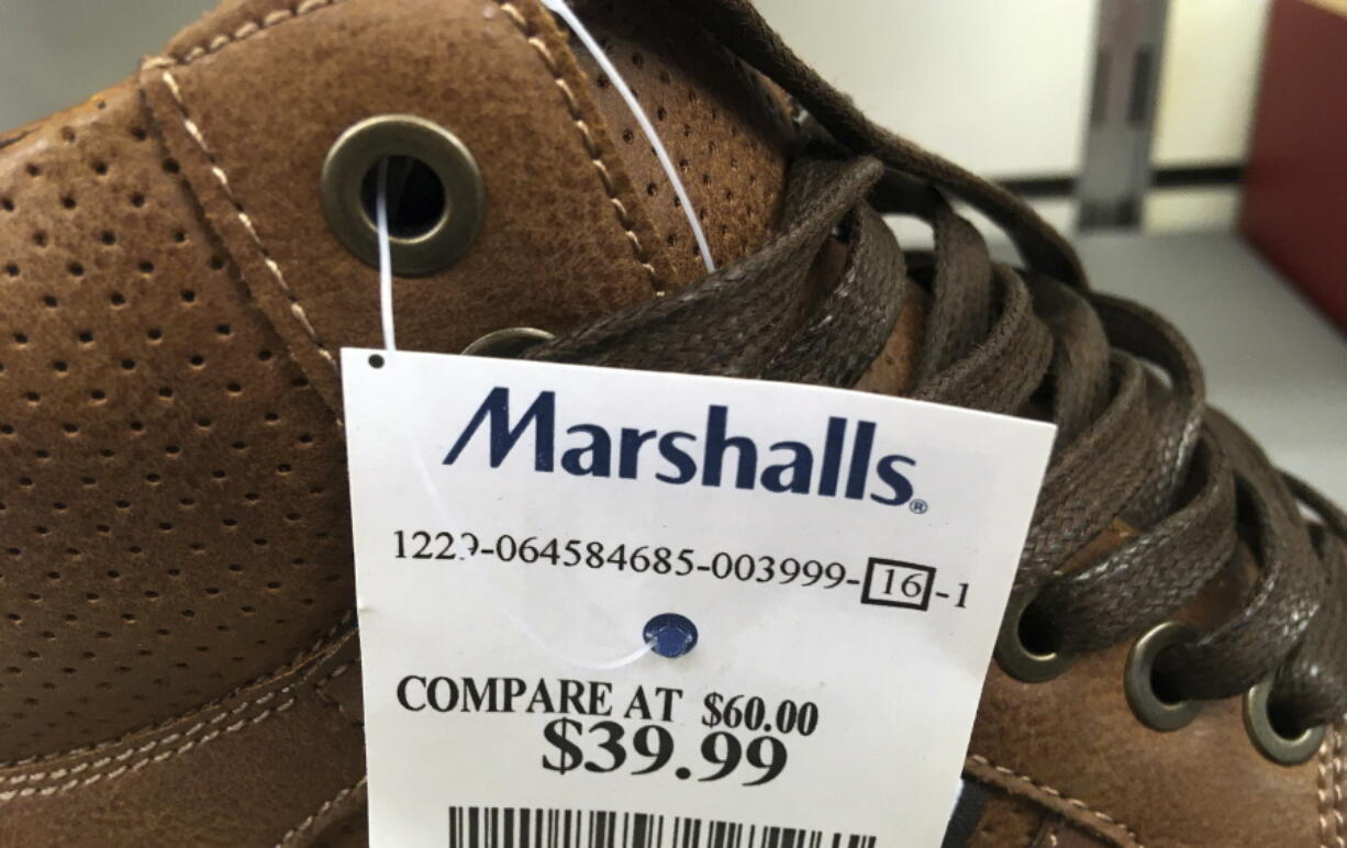 This Tuesday, May 16, 2017, photo shows a price tag on a pair of shoes for sale at a Marshalls store, in Methuen, Mass. On Friday, July 14, 2017, the Commerce Department releases U.S. retail sales data for June.