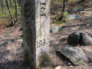 The granite monument that marks the spot where Connecticut, Massachusetts and Rhode Island meet in Thompson, Conn. There’s an unusual travel hobby that has people visiting the woods of Thompson, and other remote spots across the country. The visitors are looking for tripoints, spots where three states meet.