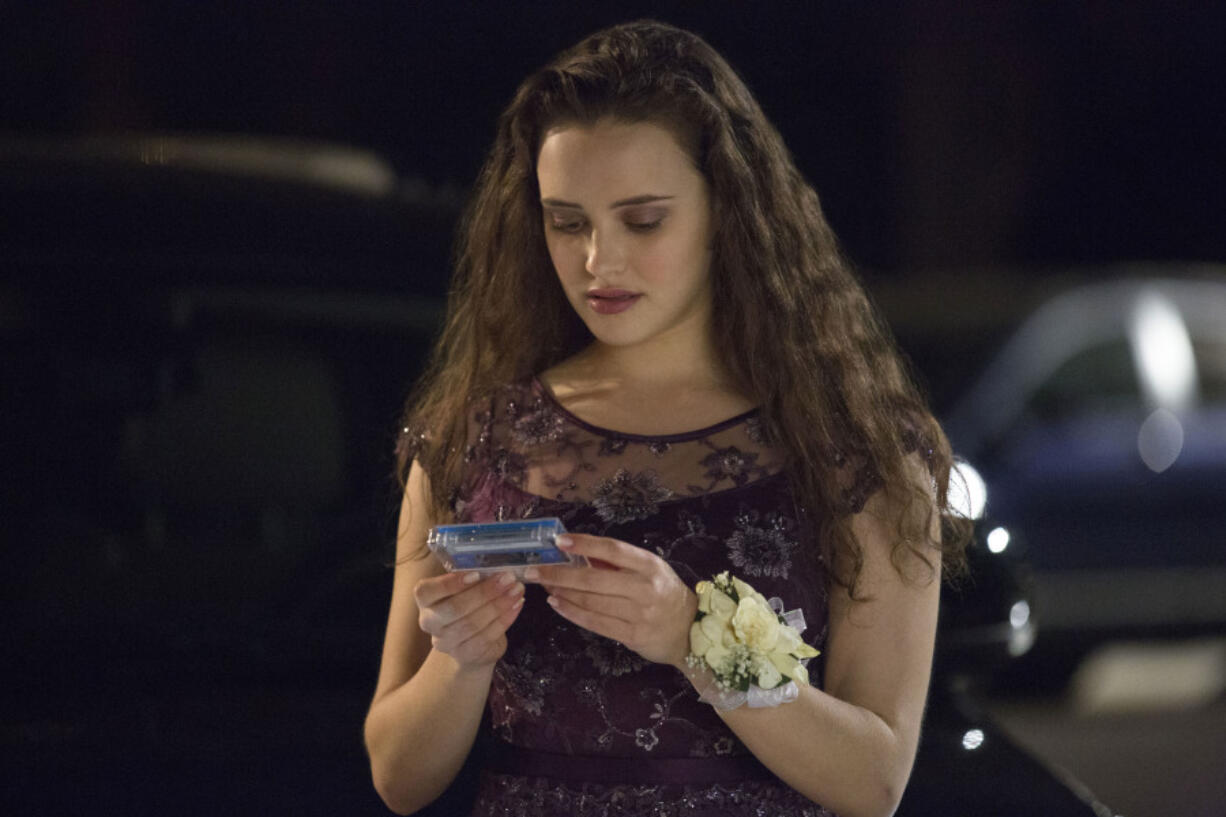 FILE - This file image released by Netflix shows Katherine Langford as Hannah Baker in a scene from the series, “13 Reasons Why.” The popular TV series about Baker’s suicide that showed her ending her life may have prompted a surge in online searches for suicide, including how to do it, according to a new study published Monday, July 31, 2017, in JAMA Internal Medicine.