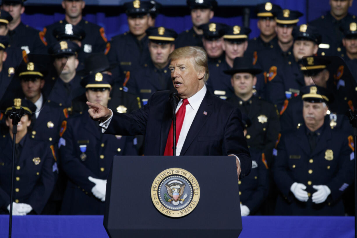 President Donald Trump speaks to law enforcement officials Friday in Brentwood, N.Y.