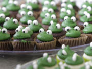 The Three Creeks Community Library celebrated its 15th anniversary with a frog-themed event which included a reptile show, froggy cupcakes and face painting.