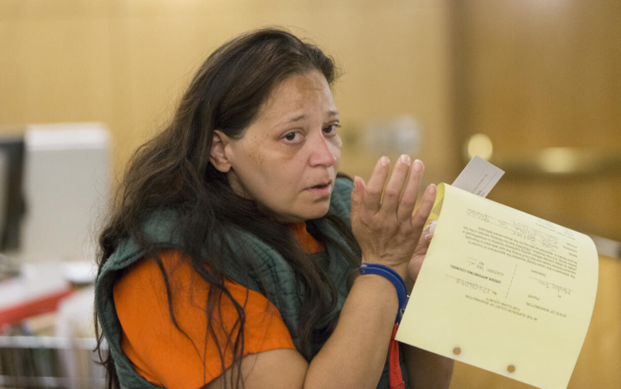 Traci Lynn Mendez, who’s accused of conspiring with four acquaintances in the beating and fatal shooting of Raymond Brandon, appears in Clark County Superior Court on Aug. 2.