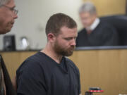 Joshua Johnson leaves the courtroom after being sentenced in Clark County Superior Court on Aug. 7. He will spend the next five years in prison.