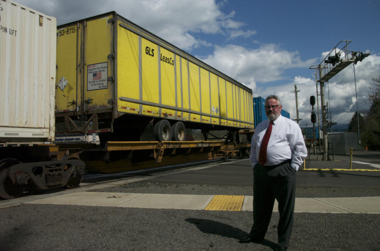 Washougal Mayor Sean Guard stands near the intersection of Main and 32nd streets in 2015.