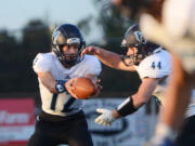 Hockinson quarterback Canon Racanelli, left, has many weapons among his receivers and a bolstered running game.