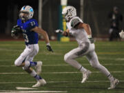 Glen Perry, Jr., left, moves to quarterback after rushing for more than 800 yards and seven touchdowns last season.(Steve Dipaola for the Columbian)