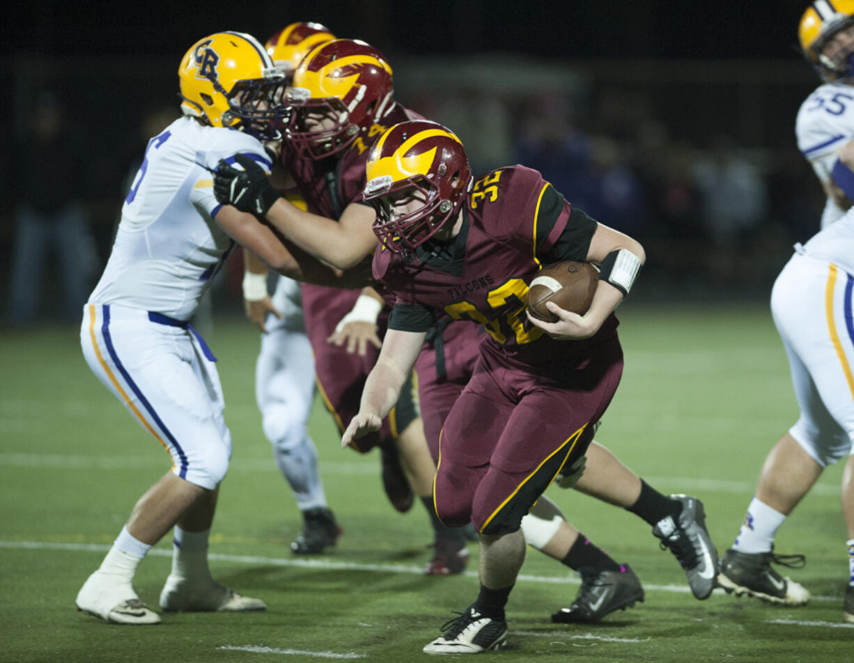 Prairie’s Carson Slagle (32) and others are embracing a new offense as the Falcons are adopting the spread.