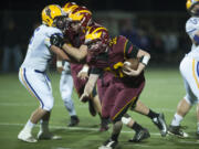 Prairie’s Carson Slagle (32) and others are embracing a new offense as the Falcons are adopting the spread.